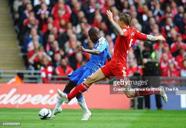 Ramires of Chelsea scores the opening goal under pressure from Daniel Agger of Liverpool during the FA Cup Final with Budweiser between Liverpool and...