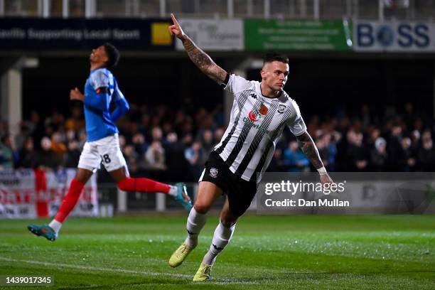 Miles Storey of Hereford celebrates scoring his teams first goal of the game during the FA Cup First Round match between Hereford FC and Portsmouth...