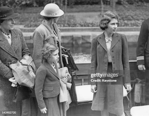 Princesses Elizabeth and Margaret on board a Thames pleasure boat, 14th July 1940.