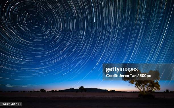 scenic view of star field against sky at night,arapiles,victoria,australia - long exposure night sky stock pictures, royalty-free photos & images