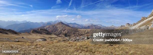 panoramic view of landscape and mountains against sky,passo giau,colle santa lucia,belluno,italy - colle santa lucia stock pictures, royalty-free photos & images