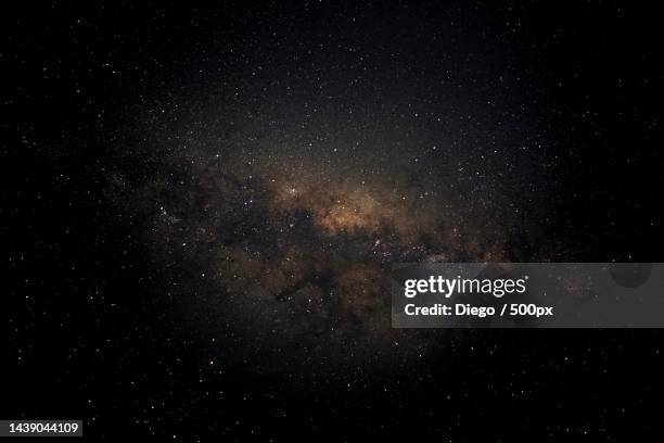 low angle view of stars in sky at night - star field stock pictures, royalty-free photos & images