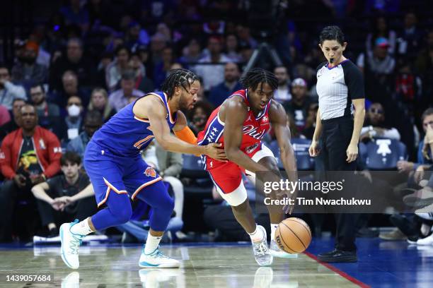 Tyrese Maxey of the Philadelphia 76ers steals the ball from Jalen Brunson of the New York Knicks during the first quarter at Wells Fargo Center on...