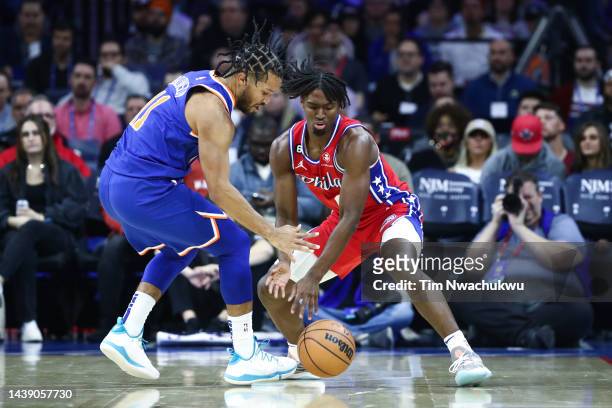 Tyrese Maxey of the Philadelphia 76ers steals the ball from Jalen Brunson of the New York Knicks during the first quarter at Wells Fargo Center on...
