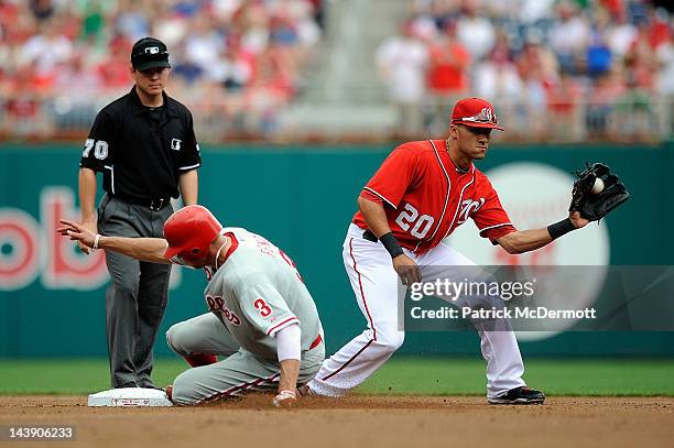 Hunter Pence of the Philadelphia Phillies slides safely into second base against Ian Desmond of the Washington Nationals Nationals Park on May 5,...