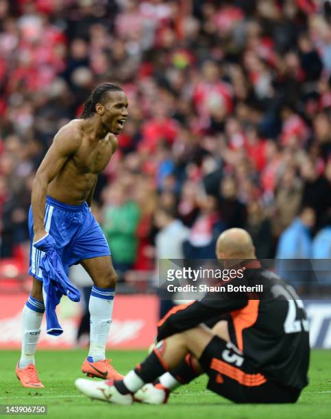 Didier Drogba of Chelsea celebrates as Pepe Reina of Liverpool sits dejected during the FA Cup with Budweiser Final match between Liverpool and...