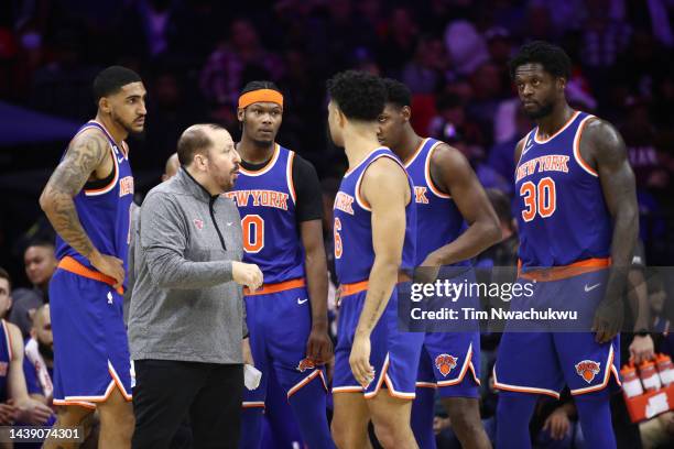 Head coach Tom Thibodeau of the New York Knicks speaks with players during the fourth quarter against the Philadelphia 76ers at Wells Fargo Center on...