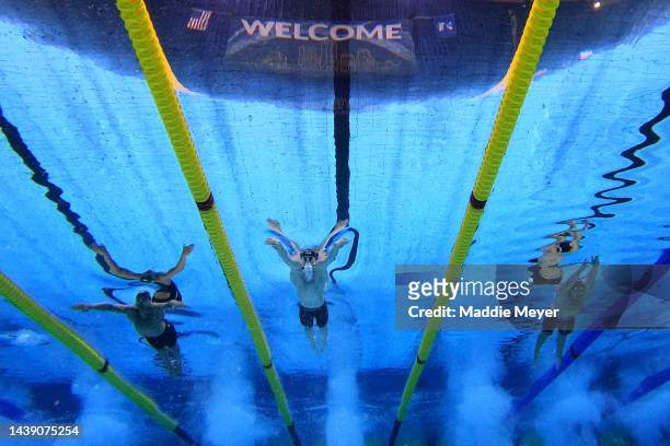Jaoa Gomes Junior of Brazil, Nic Fink of the United States, and Nicolo Martinenghi of Italy compete in the Men's 50m Breaststroke final on Day 2 of...