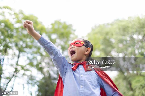 supergirl flying - child actor stock pictures, royalty-free photos & images