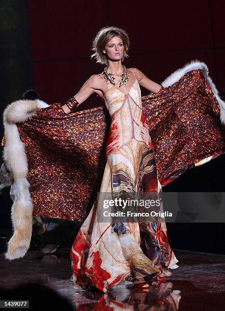 Model wears a dress from Roberto Cavalli's Spring/Summer women's 2003 collection September 30, 2002 in Milan Italy.