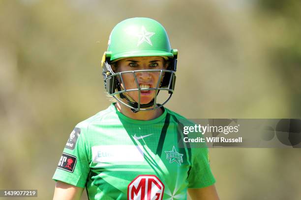 Lauren Winfield-Hill of the Stars leaves the field after being dismissed by Darcie Brown of the Strikers during the Women's Big Bash League match...