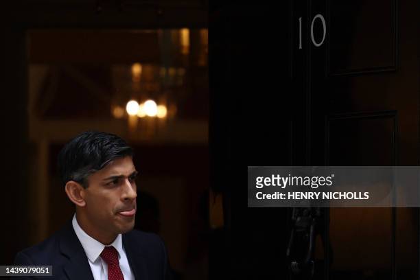 Britain's Prime Minister Rishi Sunak exits 10 Downing Street in central London on July 3 to greet Bahrain's Prime Minister ahead of their meeting.