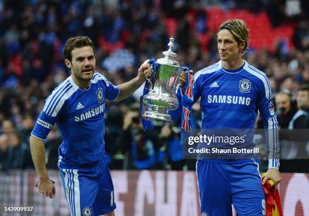 Juan Mata of Chelsea and Fernando Torres of Chelsea celebrate with the trophy after the FA Cup with Budweiser Final match between Liverpool and...