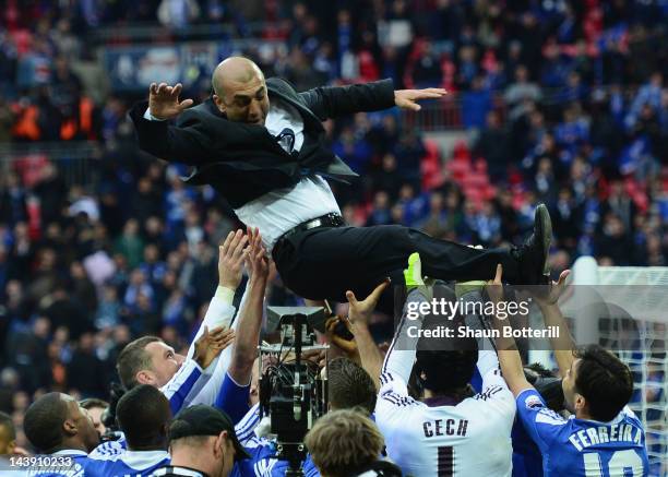 Roberto Di Matteo caretaker manager of Chelsea is lifted by his players during the FA Cup with Budweiser Final match between Liverpool and Chelsea at...