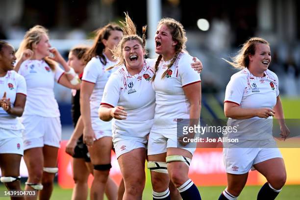 Maud Muir of England and Poppy Cleall of England celebrate after winning the Rugby World Cup 2021 Semifinal match between Canada and England at Eden...