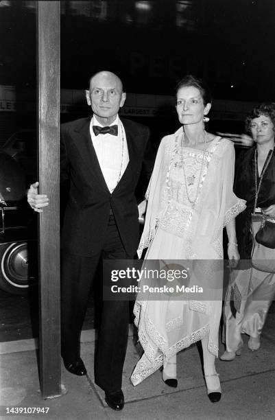 Yul Brynner and Jacqueline de Croisset attend a party at Raga's in New York City on May 2, 1977.