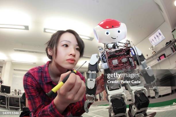 Student Building Rorbot 3,430 Students Building Robots Stock Photos, High-Res Pictures, and ...