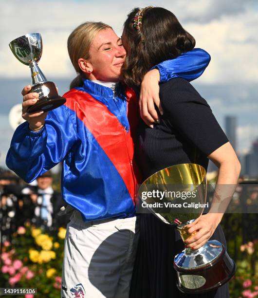 Jamie Kah and Trainer Annabel Neasham pose with the champions trophy after Zaaki won Race 8, the Tab Champions Stakes, during 2022 TAB Champions...