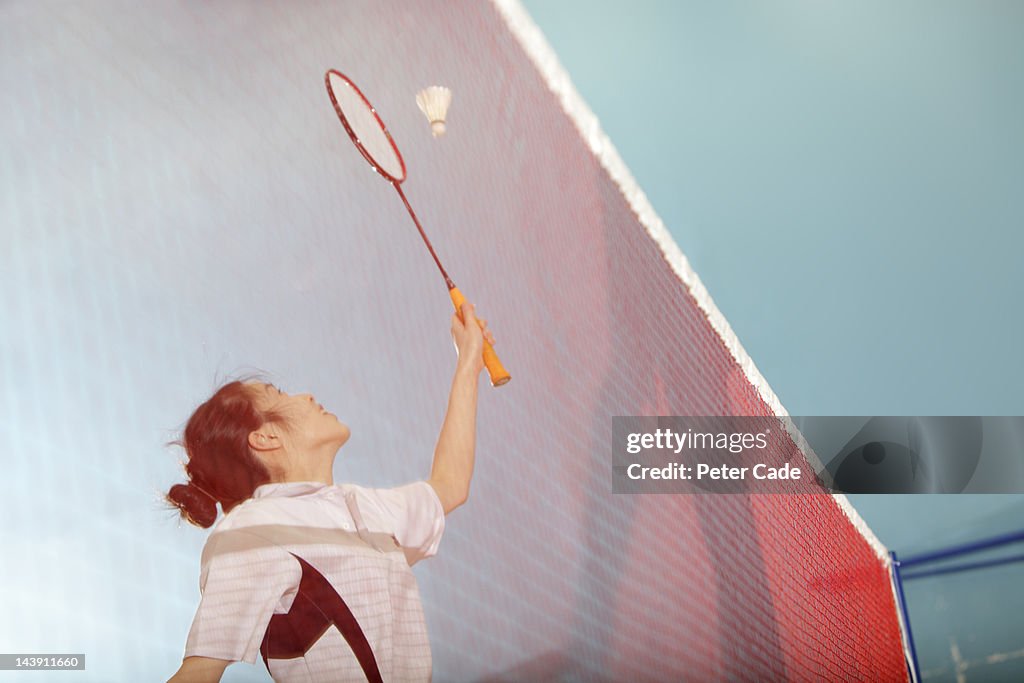 Girl playing badminton