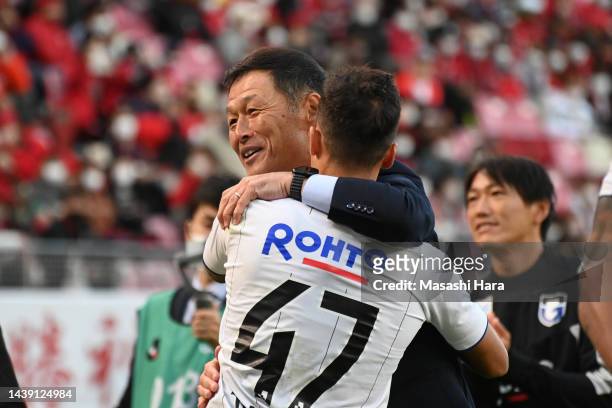 Coach Hiroshi Matsuda and Juan Alano of Gamba Osaka celebrate after the J.LEAGUE Meiji Yasuda J1 34th Sec. Match between Kashima Antlers and Gamba...