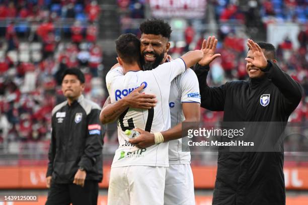 Juan Alano and Anderson Patric Aguiar Oliveira of Gamba Osaka celebrate after the J.LEAGUE Meiji Yasuda J1 34th Sec. Match between Kashima Antlers...