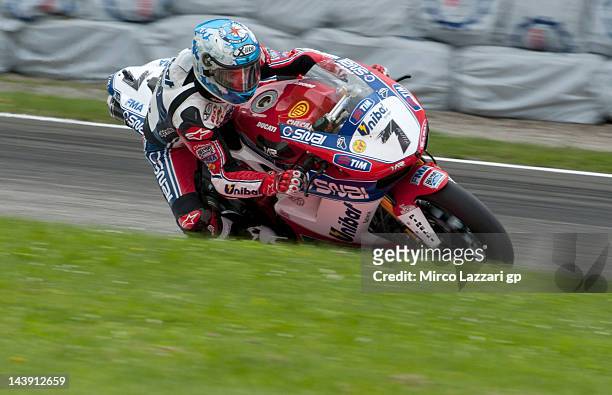 Carlos Checa of Spain and Althea Racing rounds the bend during qualifying session of the Superbike World Championship Round Four at Autodromo di...