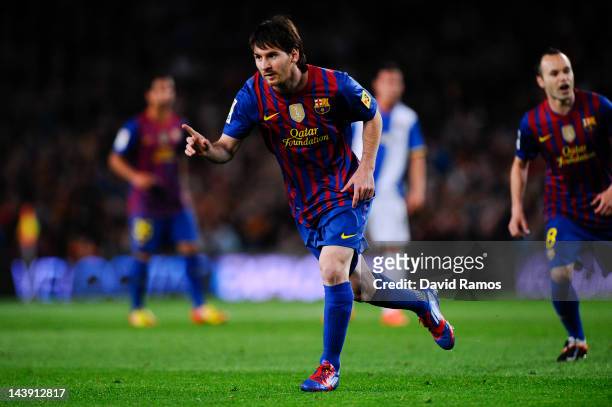 Lionel Messi of FC Barcelona celebrates after scoring the opening goal during the La Liga match between FC Barcelona and RCD Espanyol at Camp Nou on...