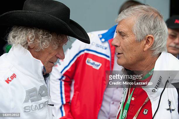 Arturo Merzario of Italy and Giacomo Agostini of Italy look on in pit during qualifying session of the Superbike World Championship Round Four at...