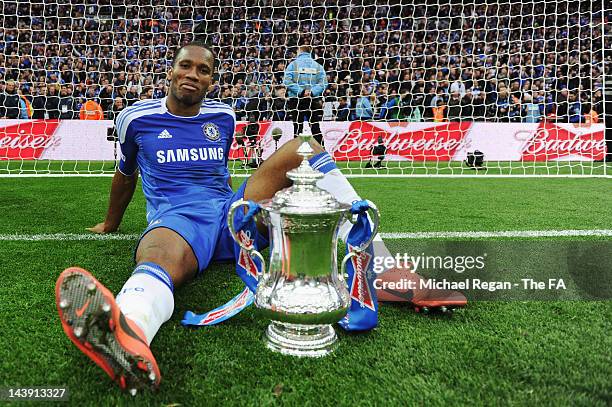 Didier Drogba of Chelsea celebrates victory with the trophy in the FA Cup Final with Budweiser between Liverpool and Chelsea at Wembley Stadium on...