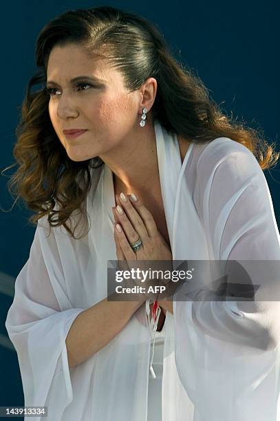 Brazilian singer Maria Rita acknowledges the audience after performing during the Viva Elis project at Parque da Juventude, in Sao Paulo, Brazil on...