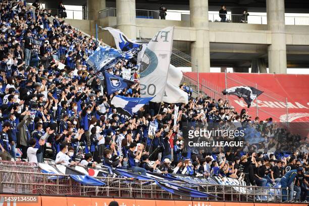 Gamba Osaka supporters celebrate as they avoid the relegation to the J2 after the 0-0 draw in the J.LEAGUE Meiji Yasuda J1 34th Sec. Match between...
