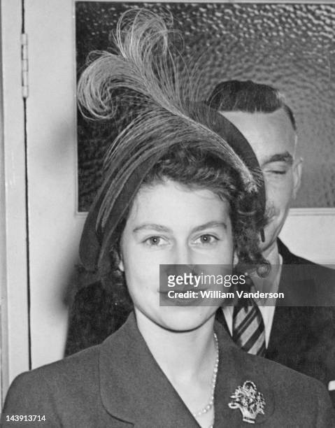 Princess Elizabeth during a visit to members of the public at their homes in Ilford, Essex, 25th October 1949.