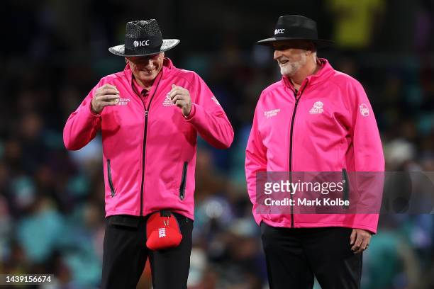 Umpires Paul Reiffel and Paul Wilson share a laugh during the ICC Men's T20 World Cup match between England and Sri Lanka at Sydney Cricket Ground on...
