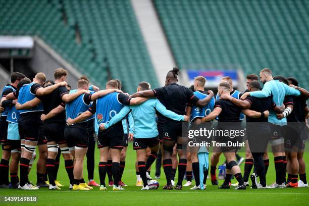 Players huddle during an England rugby training session at Twickenham Stadium on November 05, 2022 in London, England.