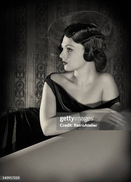 diva with the hat in film noir style. - 1940s glamour stock pictures, royalty-free photos & images