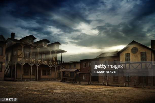 sunrise over old town - old west town stock pictures, royalty-free photos & images