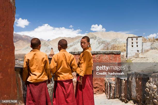 novice monks in tibetan monastery. mustang. - nepal child stock pictures, royalty-free photos & images