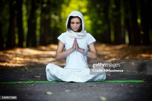 beautiful woman practicing yoga - chanting stock pictures, royalty-free photos & images