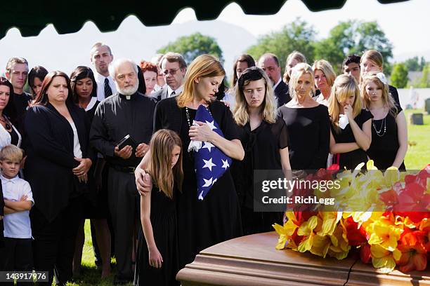 family at a funeral - military funeral stock pictures, royalty-free photos & images