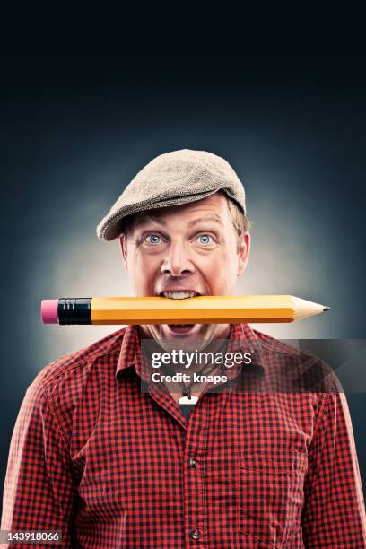 handsome man with big pencil - big cool attitude stock pictures, royalty-free photos & images