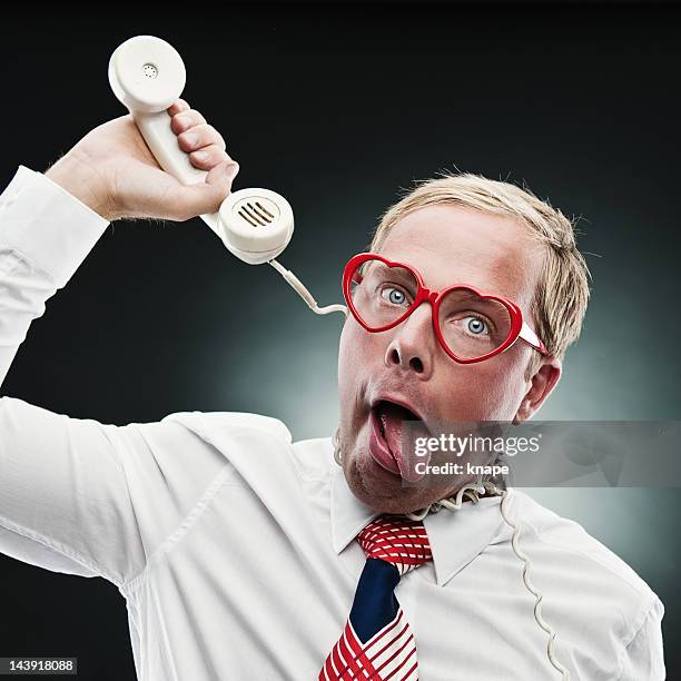 funny man in heartshaped glasses - plastic nerd glasses stock pictures, royalty-free photos & images