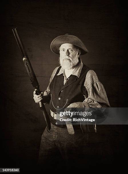 man of the wild west - cowboy hunting stock pictures, royalty-free photos & images