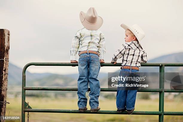 young cowboys - country western outside stockfoto's en -beelden