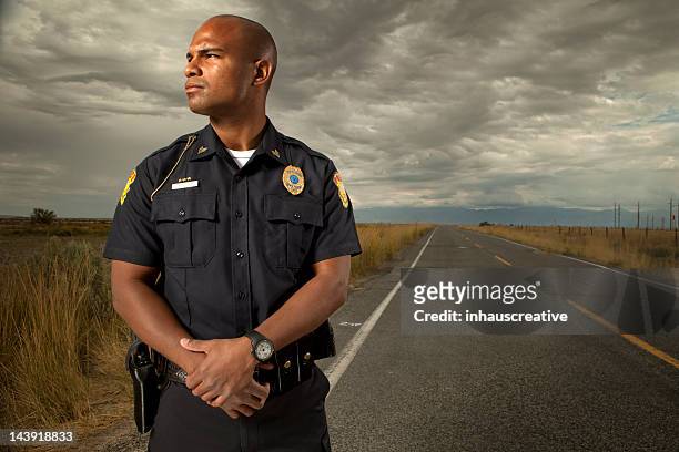 portrait of a police officer - police stock pictures, royalty-free photos & images