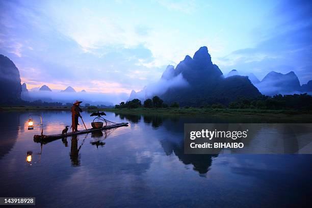 lijiang fishermen - li river stock pictures, royalty-free photos & images