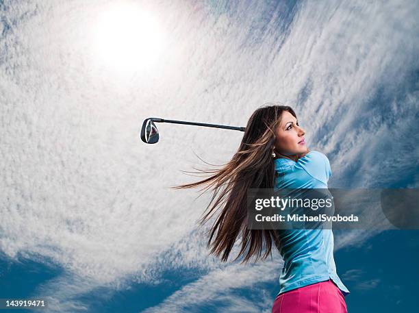 women golfer - golf swing female stock pictures, royalty-free photos & images