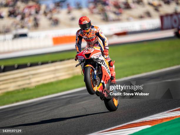 Marc Marquez of Spain and Repsol Honda Team rides a wheelie during the qualifying session of the MotoGP Gran Premio Motul de la Comunitat Valenciana...