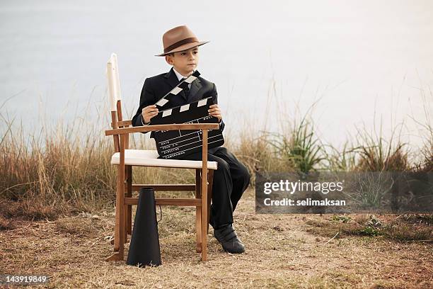 little film director in action - actor chair stock pictures, royalty-free photos & images