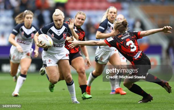 Georgia Roche of England goes over to score their sides six try during the Women's Rugby League World Cup Group A match between England Women and...