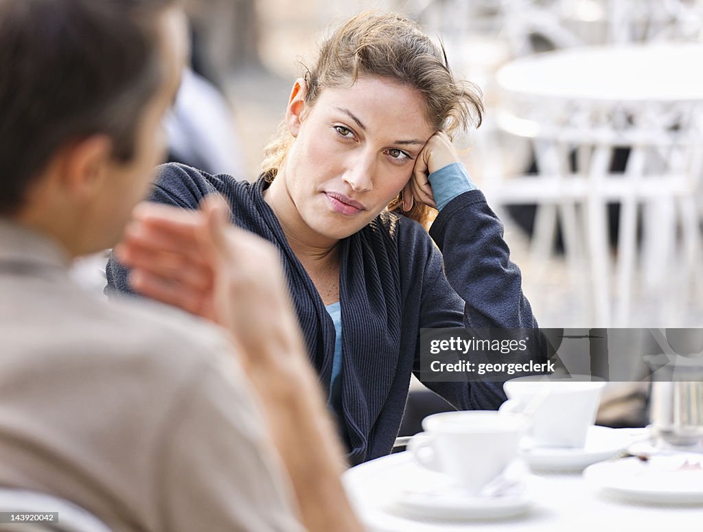 Couple Talking at a Cafe